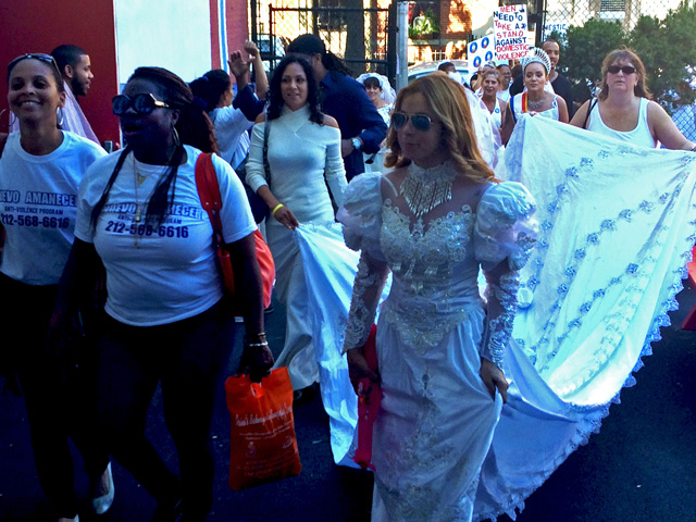 Supporters march throughout  Manhattan and the Bronx dressed in their white wedding gowns.