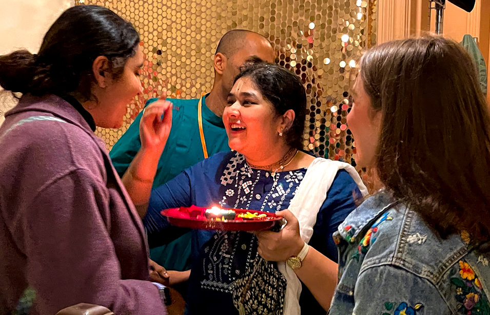 Volunteers welcomed us and offered the Bindi as decorations for the celebration upon arrival. The neighborhood came together to see an Indian musical dance performance and eat at food stalls serving authentic Indian street cuisine and drinks. There were henna vendors, face painters, and photo booths. 